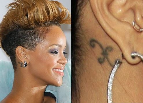 Rihanna tatuajes de peces