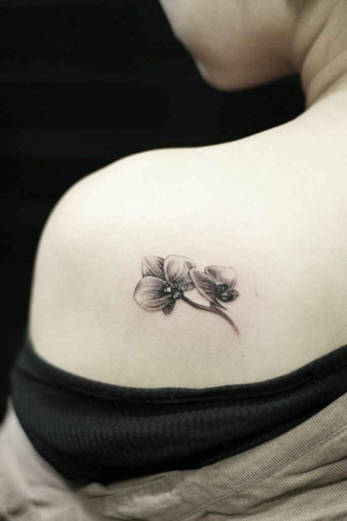 tatuaje de orquidea 144