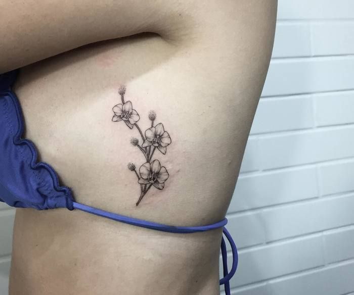 tatuaje de orquidea 153