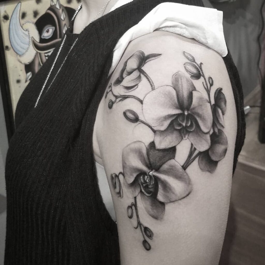 tatuaje de orquidea 175