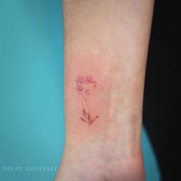 tatuaje de orquidea 203