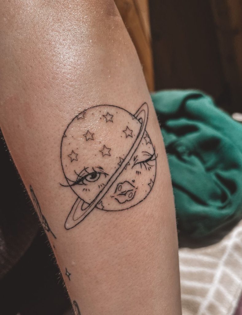 Saturno tatuajes 111