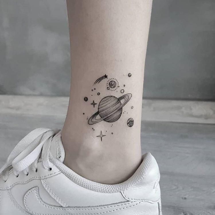 Saturno tatuajes 115