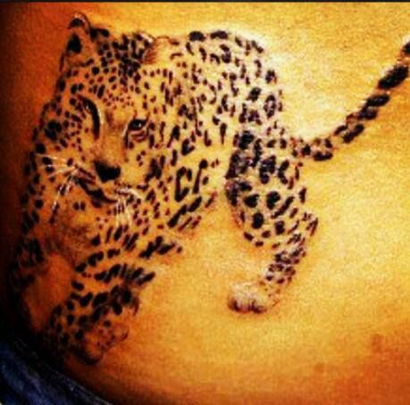 Tatuaje de leopardo de las nieves 44