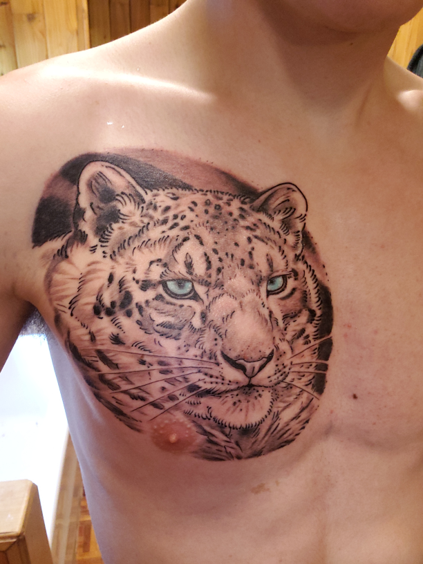 Tatuaje de leopardo de las nieves 7