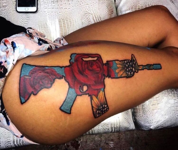 tatuaje de pistola 26