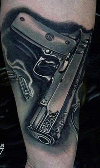 tatuaje de pistola 56