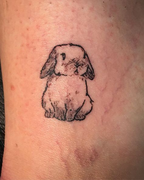 Tatuaje de conejo 184