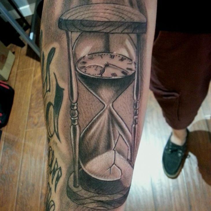 Reloj tatuaje 169